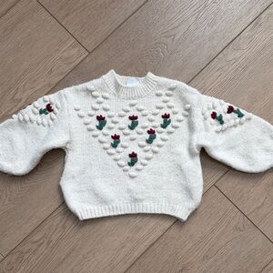 Zara White Sweater with Red and Green Accents